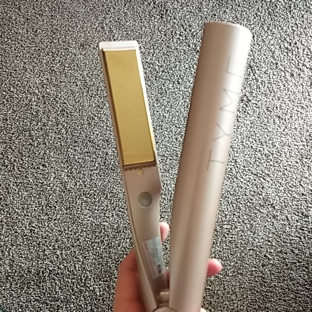 Curling/ straightening iron